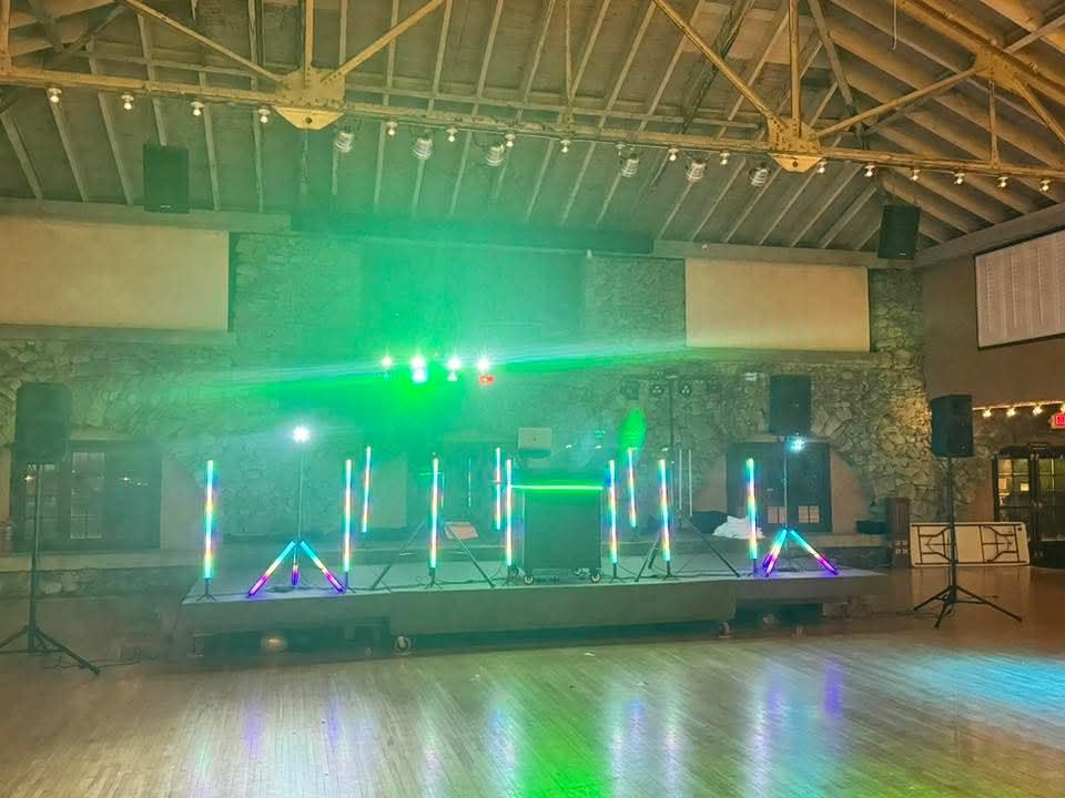 My lights and speakers set up on stage before a prom