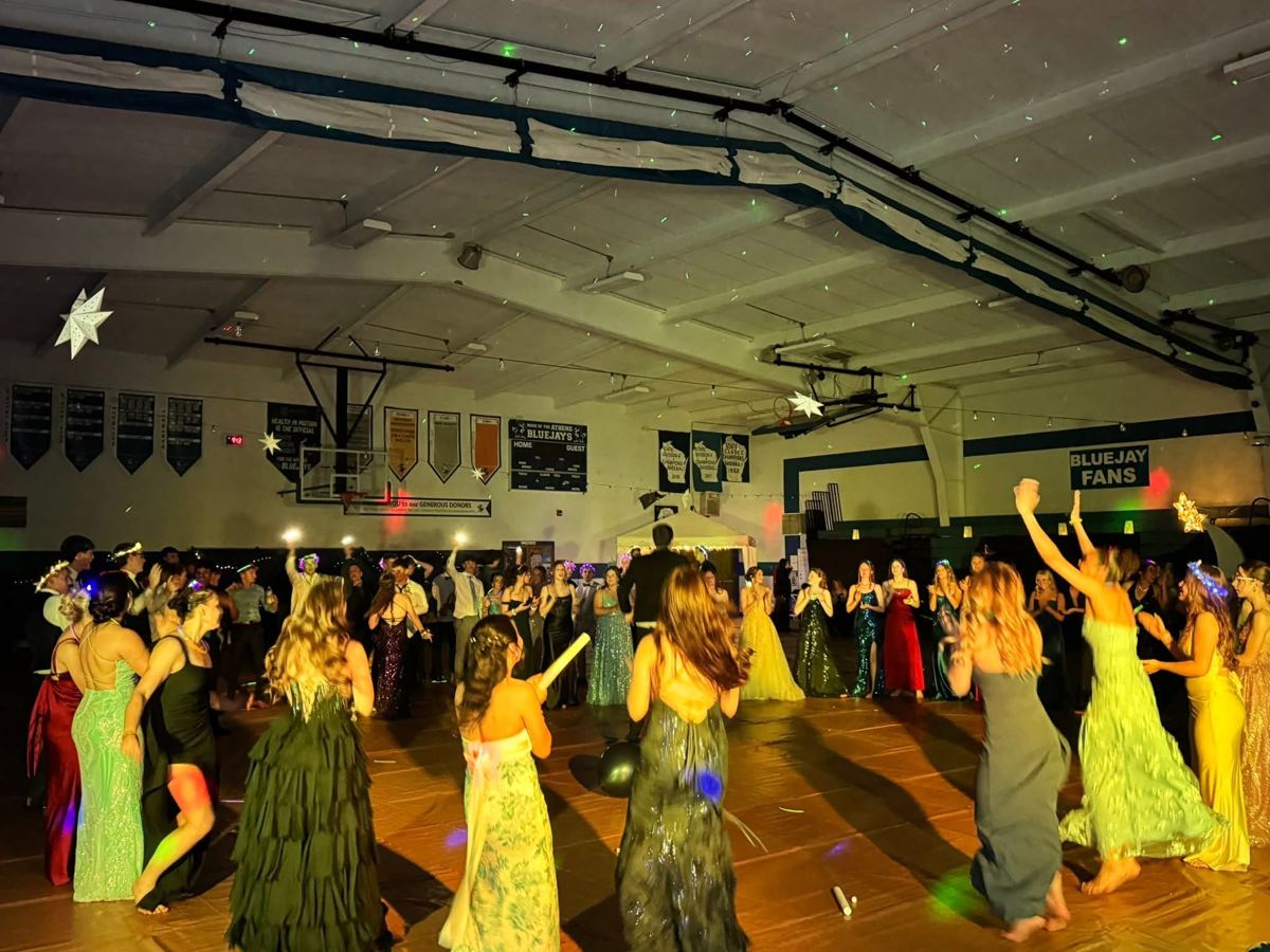 Prom-goers dancing under the stars